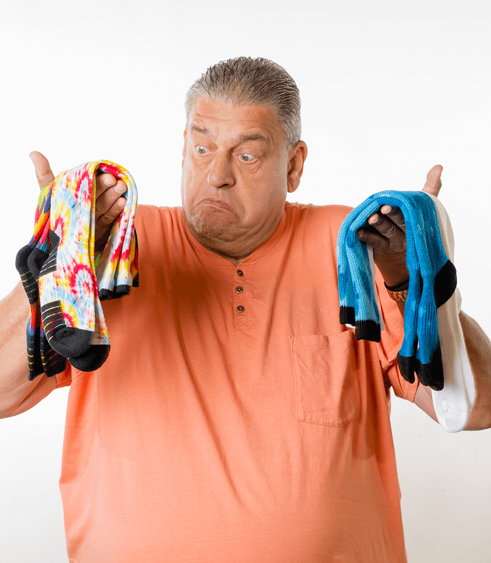 A man holding different Viasox diabetic socks